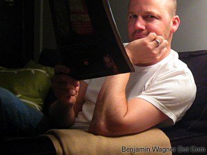Me reading Rolling Stone magazine in my apartment Wednesday night